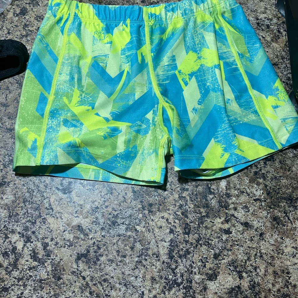 Green and blue shorts and yellow